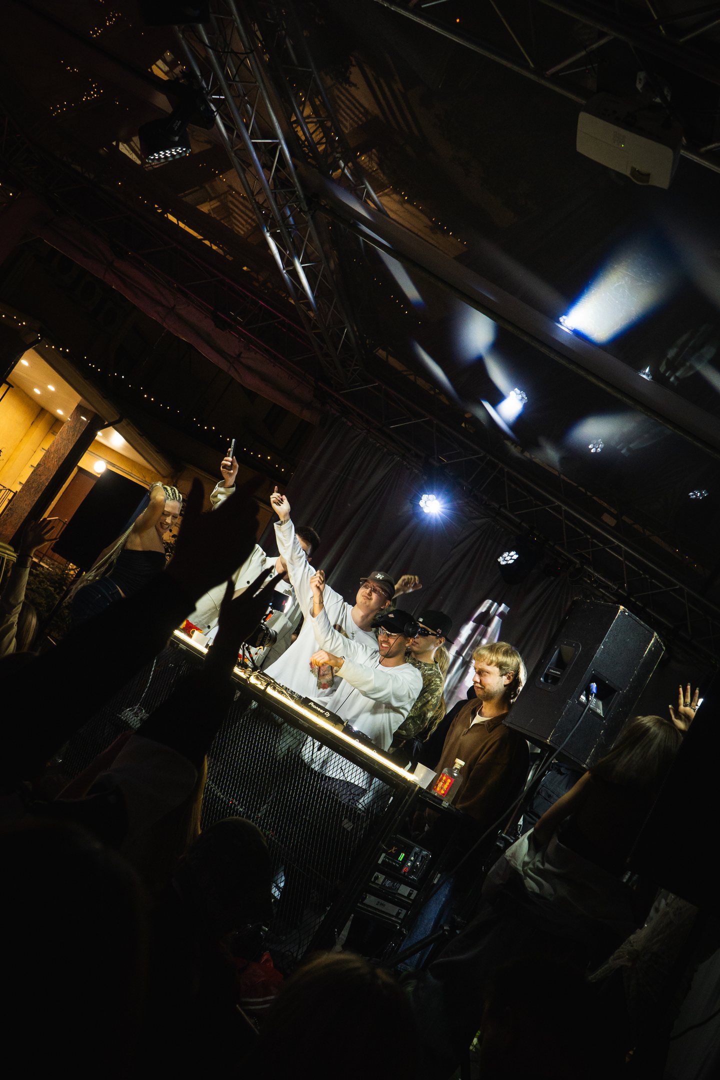 SWELL gathering under stage lights
